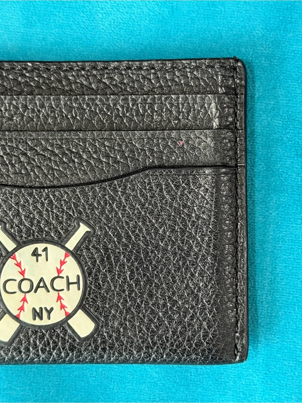 Coach sleek black